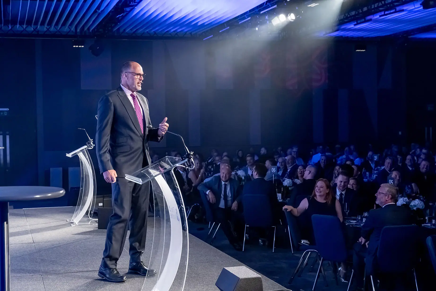 Compere for the evening Martin Bayfield adresseses the audience